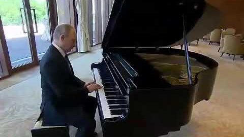 Russian President Vladimir Putin plays piano and the US president Donald Trump singing
